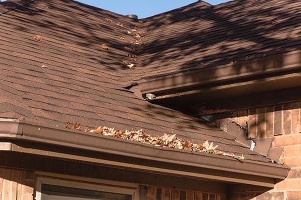 Clogged-Gutter-filled-with-leaves